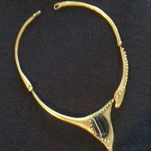 Elegant Gold Necklace with Black Stone